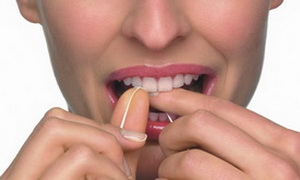 Зубная нить может нанести больше вреда, чем пользы?
